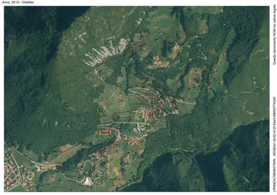Porzioni di  terreni agricoli estesi per oltre 22.000 mq, situati in parte in prossimità dell’abitato del paese ed in parte in zona montana e boschiva in declivio, raggiungibili tramite sentieri e mulattiere, identificati al Catasto dei Terreni al foglio 9 con le particelle 103, 286, 287, 288, 1213, 1220, 1862, 2099, 2145, 2146, 2147, 2247, 2266, 2275, 2276, 2277, 2278, 2273, 1931, 2291.