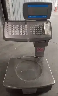 1)Bilancia elettronica professionale peso-prezzo-importo...