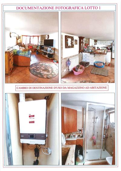 Magazzino + area giardinata in porzione di villino. Nel magazzino, sito al piano terra, sono presenti un soggiorno con angolo cottura, un bagno ed una scala di collegamento al piano primo. Il magazzino non è conforme al titolo rilasciato, in quanto come rappresentato nella CTU del Geometra Alessandro Galimberti del 26/05/2026, che si richiama integralmente, è stato riscontrato “un cambio di destinazione d’uso da magazzino ad abitazione al piano terra, ampliamento nella parte retrostante del fabb