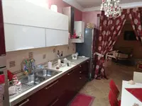 Appartamento piano rialzato, con aree scoperte per un...