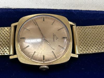 Lotto 2: Un orologio uomo marca Perseo carica manuale con bracciale in oro giallo 77,45 g lordi con relativa custodia