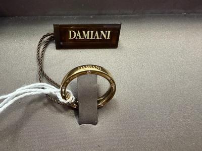 RIF 3: FEDE IN ORO GIALLO 18 KT MARCA DAMIANI MODELLO CERCHI DI LUCE GR 4,8 CON 10 DIAMANTI PER CT 0,15 COMPLESSIVI