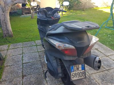 Scooter Honda Sw-T400,Per visionare la documentazione...