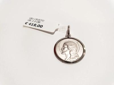 (Lotto n.1795) un ciondolo in oro bianco 18 kt con immagine di Cristo gr. 2,10
