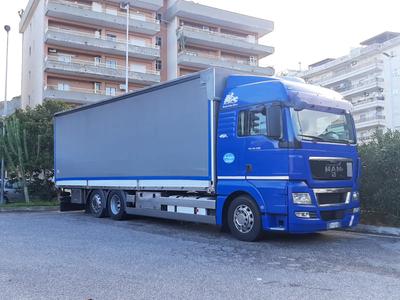 LOTTO 2: Autocarro costituito da cassone a sponde, marca "Man" modello "...
