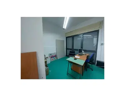 Deposito al piano terra, facente parte di un edificio composto da sette...