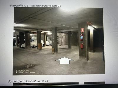 Posto auto coperto al piano interrato di edificio condominiale (ente 13 di mq.20)
