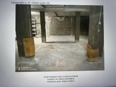LOTTO 4 - posto auto coperto (ente 14 di mq.17) al piano interrato di edificio condominiale