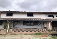 Abitazione su due livelli con area pertinenziale....