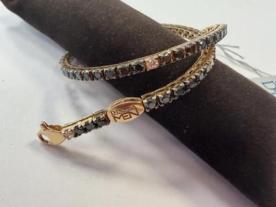 RIF 32: BRACCIALE IN ORO ROSA 18 KT TIPO TENNIS MARCA D-DONNA GR. 8,18 CON DIAMANTI F-VS PER CT 0,28 COMPLESSIVI E DIAMANTI NERI PER CT 2,89 COMPLESSIVI