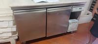 UN BANCO FRIGO A DUE ANTE IN ACCIAIO IN BUONE CONDIZIONI  