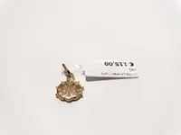 (Lotto n.1843) un ciondolo in oro giallo 18 kt a forma...
