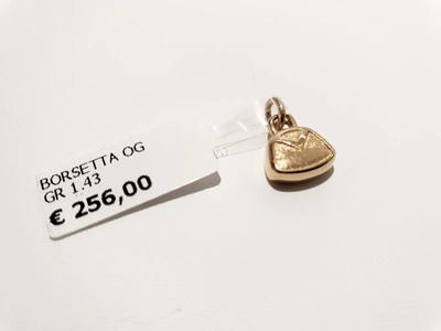 (Lotto n.1820) un ciondolo in oro giallo 18 kt privo di marchio a forma di borsetta gr. 1,40