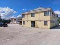 Porzione di complesso industriale commerciale sito ad...