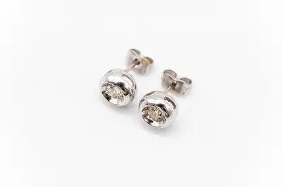 Orecchini in oro bianco e diamante (Lotto 288)