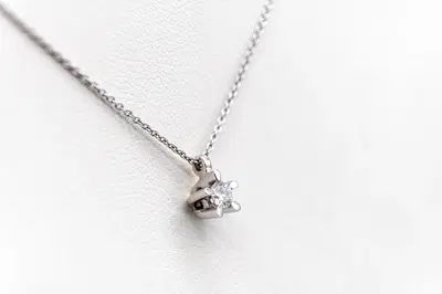 Collana ed orecchini in oro bianco con diamanti (Lotto 287)