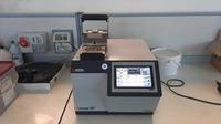(Lotto n.22) - Inglobatrice marca QATM modello QPRESS 50 matricola 32351 anno 2023, completa di aspiratore. 
