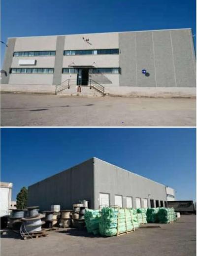 Fabbricato industriale costituito da un fabbricato principale a destinazione commerciale/logistica e da un fabbricato secondario a destinazione residenziale (alloggio custode), con annesso piazzale asfaltato per manovra mezzi e spazio di parcheggio. Identificato al catasto Fabbricati al Foglio 20, Particella 655, Sub. 1, Categoria D/1 - Foglio 20, Particella 655, Sub. 2, Categoria A/3