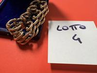 UN BRACCIALE A SEMICERCHI IN ORO TITOLO 750, PESO G. 36,60  