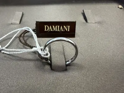 RIF 8: FEDE IN ORO BIANCO 18 KT MARCA DAMIANI GR 2,5 CON UN DIAMANTE PER CT 0,015