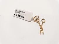 (Lotto n.1821) un ciondolo in oro giallo 18 kt a forma...