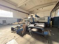 IMPIANTO TAGLIO LASER CON GRU A BANDIERA