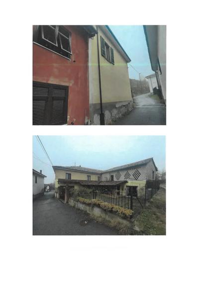 Piena proprietà di fabbricato unifamiliare semi indipendente con accessori e corte esclusiva, composto al primo piano da: ampio locale soggiorno, cucina, disimpegno, bagno, ripostiglio, due camere (dai vani residenziali si ha accesso anche ad altro locale, attualmente al rustico, destinato a ripostiglio).  Al piano terra sono presenti locale deposito attrezzi, sgombero, ampio locale cantina, box e zone porticate. E' altresì presente ampio fienile. Occupato in forza di titolo opponibile alla procedura.