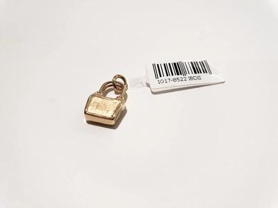 (Lotto n.1832) un ciondolo in oro giallo 18 kt a forma di borsetta gr. 1,82