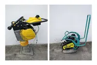 Compattatore a piastra vibrante Ammann e vibrocostipatore Bomag